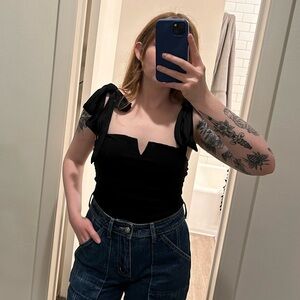 Free people black adjustable tie straps bodysuit size small